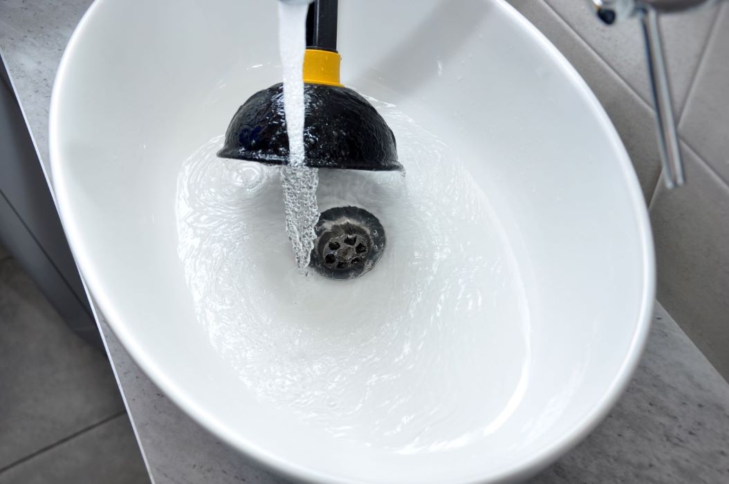 removing clog from sink